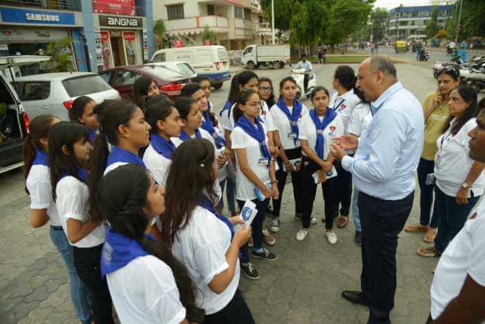 NSS student of S.M Patel College of home science at Town Hall Traffic Circle, Anand.