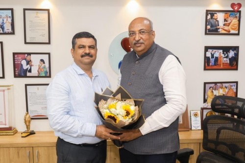 Assistant Commissioner of Police (ECO Cell) Shri G. A. Sarvaiya congratulated Nileshbhai Mandlewala after the announcement of the Padma Shri award by the Government of India.