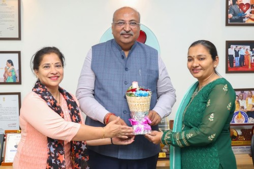 Mrs. Anishaben Patel and Mrs. Bhavanaben Seth congratulated Nileshbhai Mandlewala after the announcement of the Padma Shri award by the Government of India.