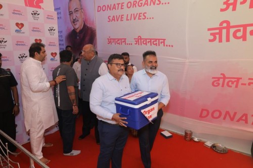Anilbhai Mandviwala, DGM, and Krunalbhai Gandhi, AGM, of The Surat People's Co-operative Bank Limited visited a Ganesh pandal organized by 'Donate Life' and 'Vastav Group' based on the theme of organ donation.
